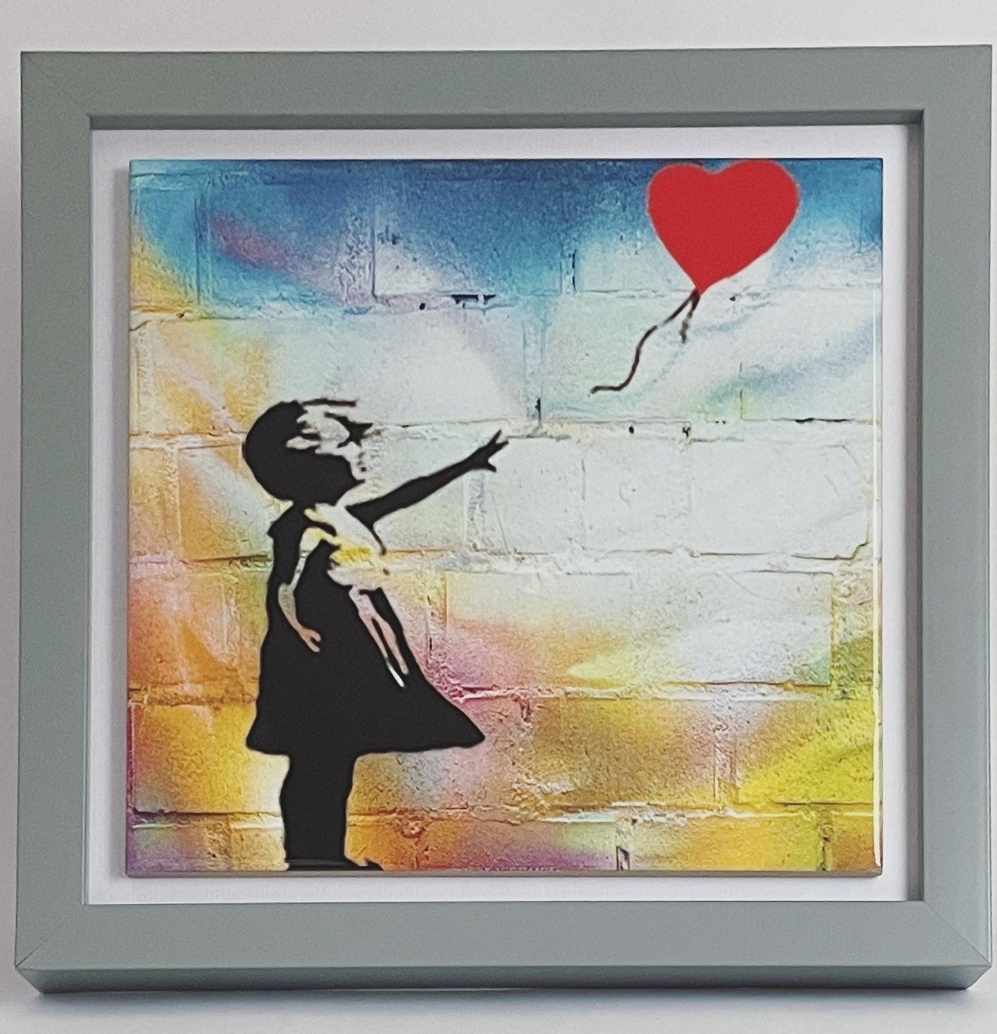 Banksy art ceramic tile.